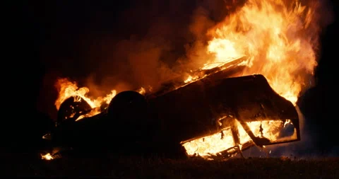 Traffic Accident with Burning Car Stock Footage 295798862