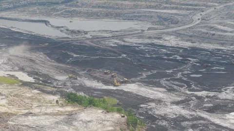 Traffic activities and excavated mud and mud suction equipment in excavatio.. Stock Footage 333023601