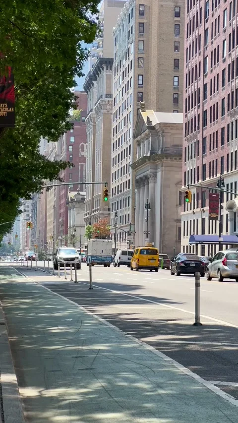 Traffic and architecture along Central Park West in Manhattan Stock Footage 313809584