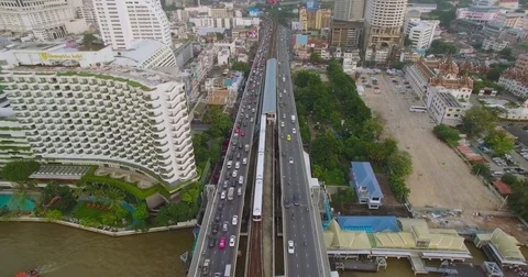 Traffic and BTS on Chao Phraya Bridge, Bangkok, Thailand, Drone Shot Video stock 75669665
