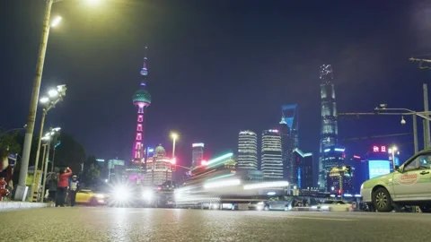Traffic and crowd at night view of Shanghai Bund , china,timelapse Stock Footage 130885819