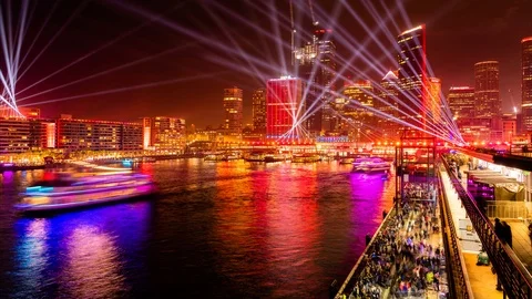 Traffic and crowds at Circular Quay, Sydney Harbour during the Vivid (tilt) Stock Footage 111945906