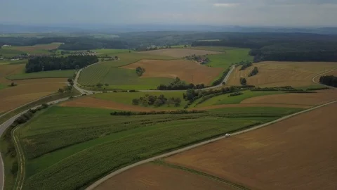 Traffic and fields in front of the long extinct volcanoes of the Hegau region Stock Footage 116620061