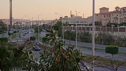 Traffic and moving vehicles in Sheikh Zayed City in Egypt Stock Footage 271137543