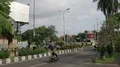 Traffic and palm tree main road scenery with vehicles and motorbikes in Bali 4k or 4k+ Resolution