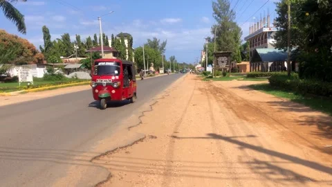 Traffic and People on Main Diani Ukunda Road Kwale County Kenya East Africa Stock Footage 253083547