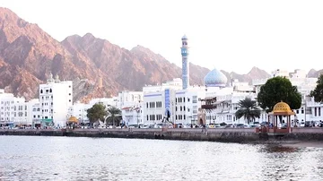 Traffic and sea view with mosque at the cornice in Muscat, Oman, Middle East Stock Footage 85626748