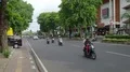 Traffic and street view scenery with lot of vehicles and motorbikes in Bali 4k or 4k+ Resolution