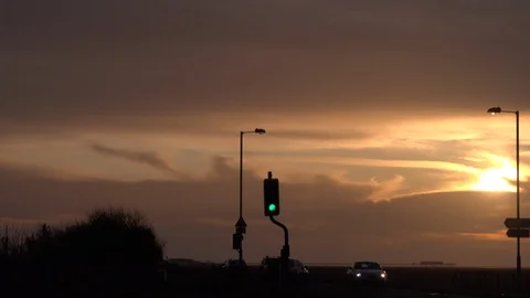 Traffic and sunset sky evening England UK 4K Stock Footage 125067345