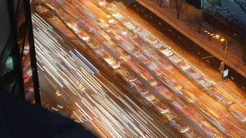 Traffic and a traffic jam with blurred car lights leaving traces behind 库存影片 83038573