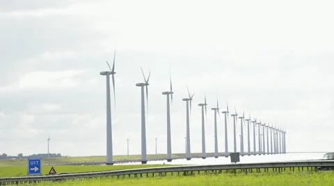 Traffic and wind turbines Stock Footage