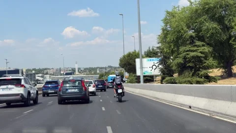 Traffic approaching Las Tablas and Sanchinarro from the A-1 service road in Stockbeeldmateriaal 339026459