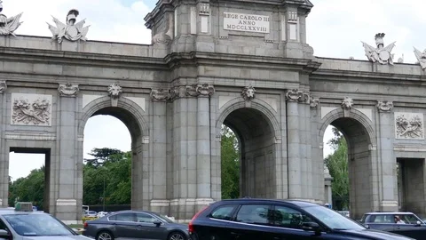 Traffic around the Alcala Gate in Madrid Stock Footage 76599149