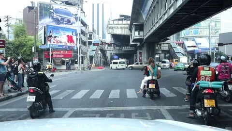 Traffic at Asoke intersection, Sukhumvit road Bangkok Thailand, March 12, 2018 Stock Footage 87008808