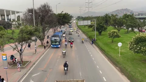 Traffic in the avenida boyaca near tunal park Stock Footage 239421069