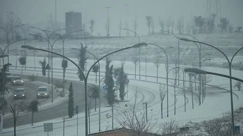 Traffic in avenue under the snow Stock Footage 10737655