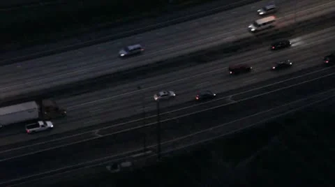 Traffic Backing Up on Interstate at Night - Aerial Stock Footage 10577747