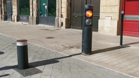 Traffic barrier with red light to limit access to pedestrian area. Restricted Stock Footage 131395690