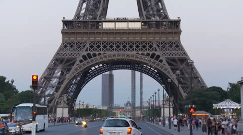 Traffic at the base of the Eiffel Tower - Paris France 29.97 Stock Footage 27020666