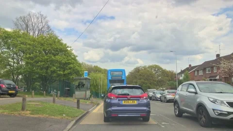 Traffic behind bus Stock Footage 153225750