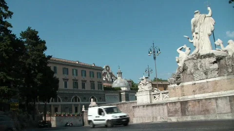 Traffic behind a statue  Stock Footage 526713