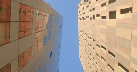 Traffic between two tall buildings, bottom view. Stock Footage 165955600