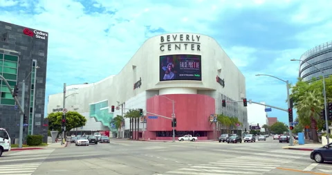Traffic at Beverly Center and digital advertising display billboard Los Angeles Stock Footage