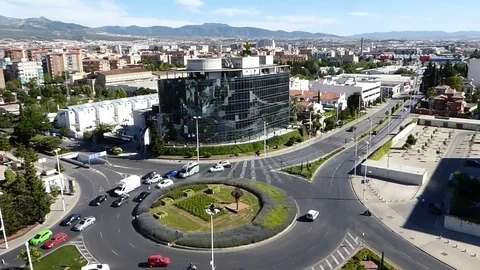 Traffic on big round about in Granada city, Spain Stock Footage 82466467