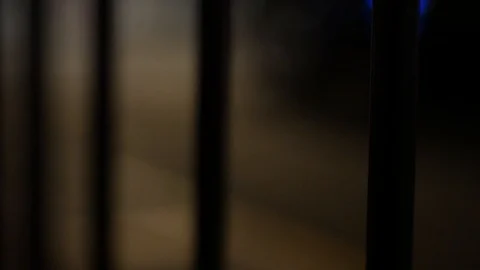 Traffic Bokeh Behind Bars Video stock 105224118