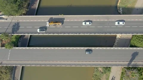 Traffic on the bridge above the river Stock Footage 228127446