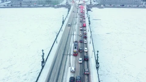 Traffic on the bridge during snowfall Stock Footage 223764349