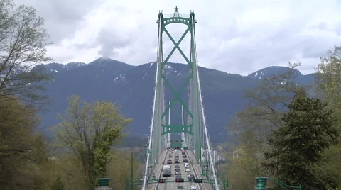 Traffic on bridge.  Full view of bridge with hills in B/G Video stock 48330647