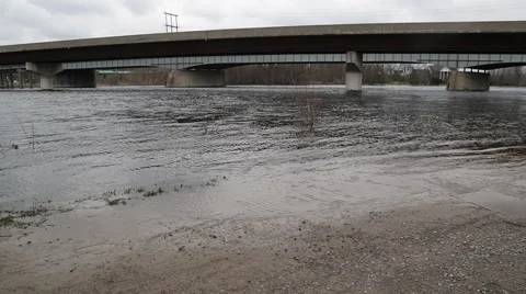 Traffic bridge over a overflowing river 스톡 동영상 58299446