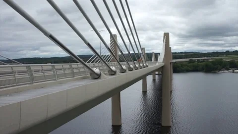 Traffic on a bridge over river Video stock 79943415
