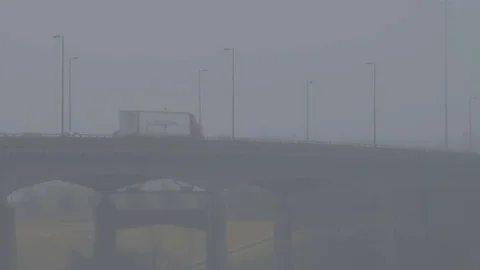 Traffic on Bridge with Pollution Stock Footage 75620757