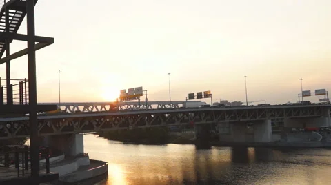 Traffic on the bridge at sunset Stock Footage 68742541