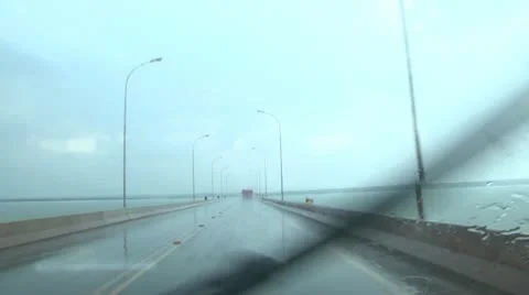 Traffic on the bridge under rain, view from the driver of the car Stock Footage 12652927