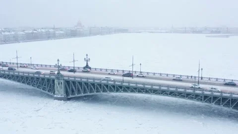 Traffic on the bridge, winter snowfall Stock Footage 223763296