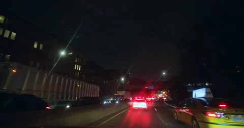 Traffic On The Brooklyn Queens Expressway. Inside car POV, nighttime. Stock Footage 164932204