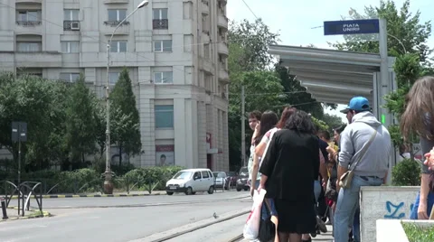 Traffic in Bucharest, Romania, boulevard, people on streets, tramway station Stock Footage 33308684