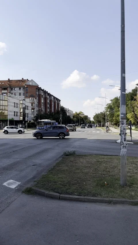 Traffic on Bulevar Kralja Petra I in Novi Sad, Serbia Stock Footage 346476187