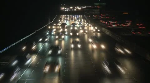 Traffic on the Busy Freeway at Night - Time Lapse Stock Footage 10715250