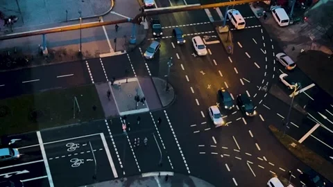 Traffic at a Busy Street Intersection in the Evening Showing Vehicles and Stock Footage 329242202