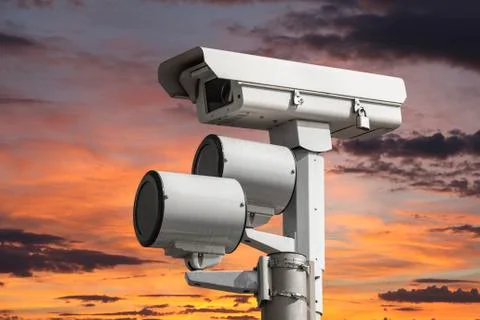 Traffic camera with sunset sky Stock Photos