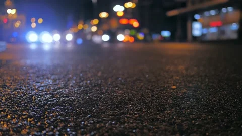 Traffic car light evening rain cinematic city urban transportation Stock Footage 132101034