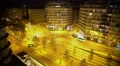 Traffic on central street at night city, deserted business center in megalopolis 4k or 4k+ Resolution
