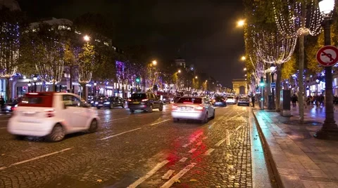 Traffic at the Champs Elysees by night Stock Footage 44725213