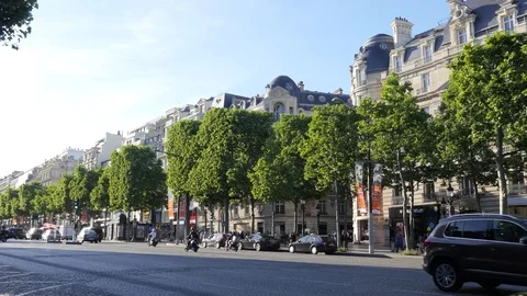 Traffic on the Champs Elysees in Paris in evening Stock Footage 76315066
