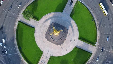 Traffic circle rotation slow counterclockwise direction Golden Victory Column Stock Footage 213322954