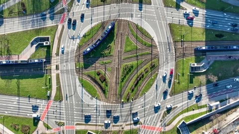 Traffic circle with tramways, trams and cars in Krakow, Poland. Aerial view Stock Footage 263355097